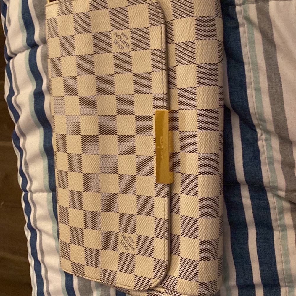 Cutest girly clutch Louis Vuitton